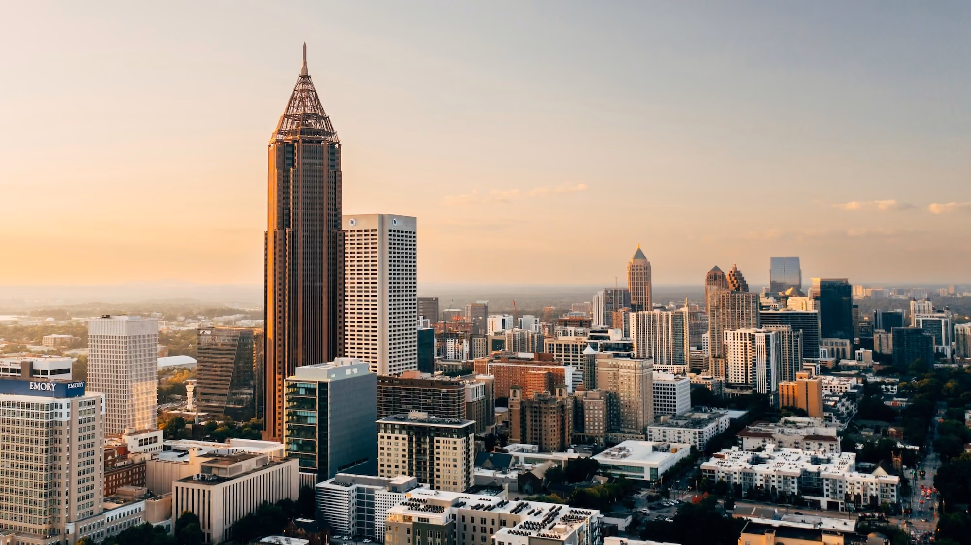 The Atlanta skyline at golden hour, seen from above Midtown